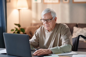 Life Assure Senior Woman Sitting In Chair And Laughing With Caregiver Nurse Blog